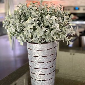 Home decor faux floral in galvanized olive basket